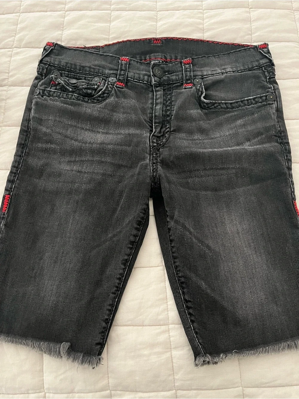 True Religion Men’s Black Denim Cutoff Shorts with flaw